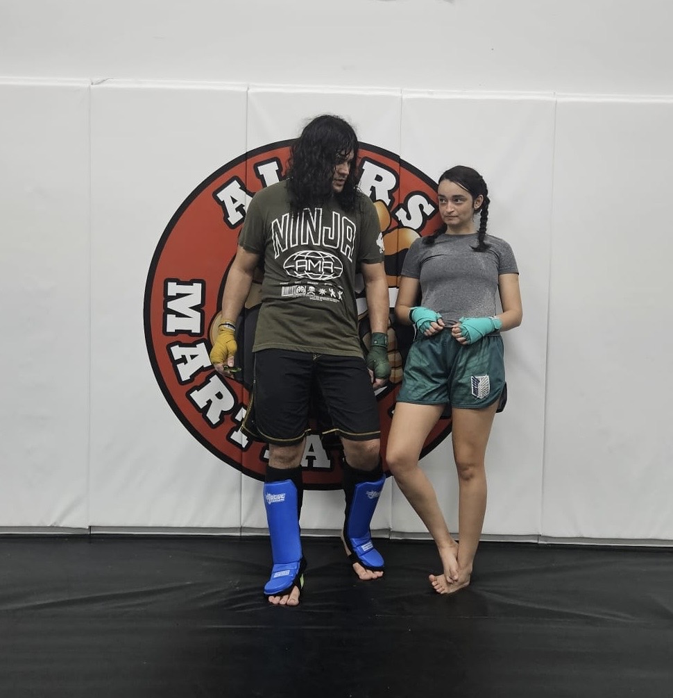 Gaby and PJ in an early kickboxing class