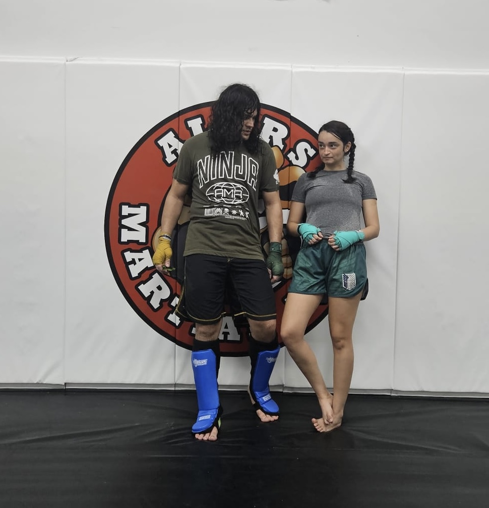 Gaby and PJ in an early kickboxing class